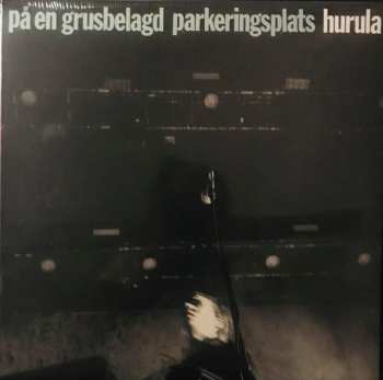 CD Hurula: På En Grusbelagd Parkeringsplats