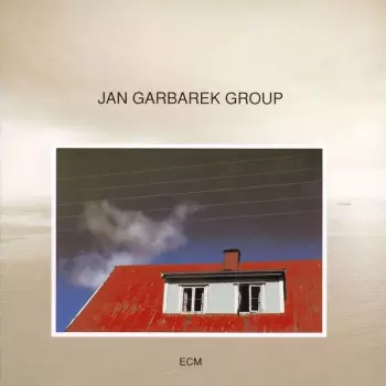 Photo With Blue Sky, White Cloud, Wires, Windows And A Red Roof